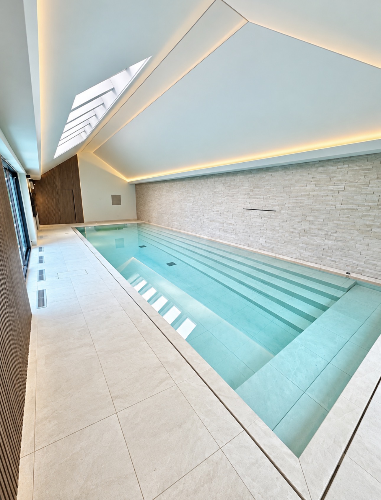 Pool steps and textured feature wall tiling