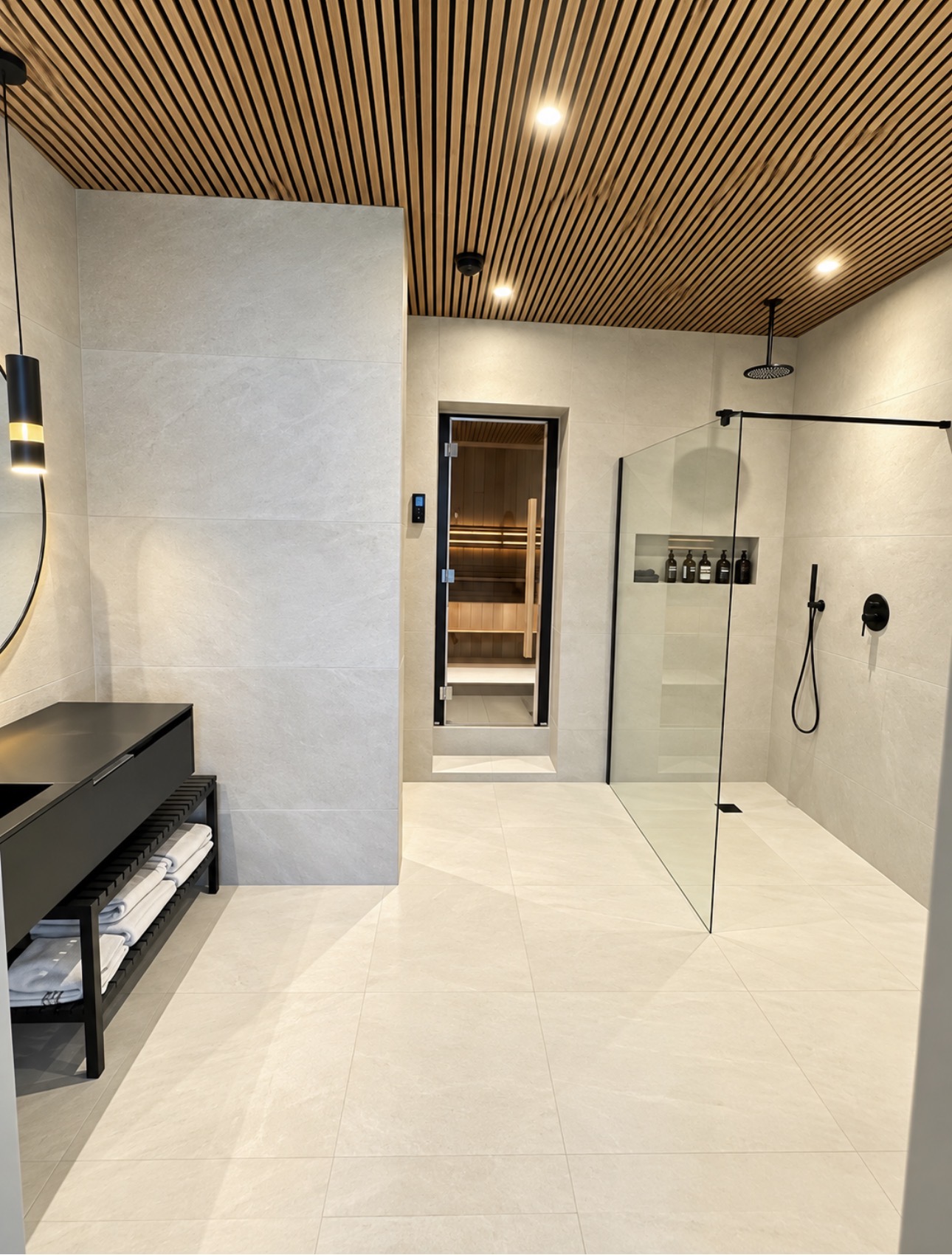 Contemporary shower and changing area with timber slatted ceiling