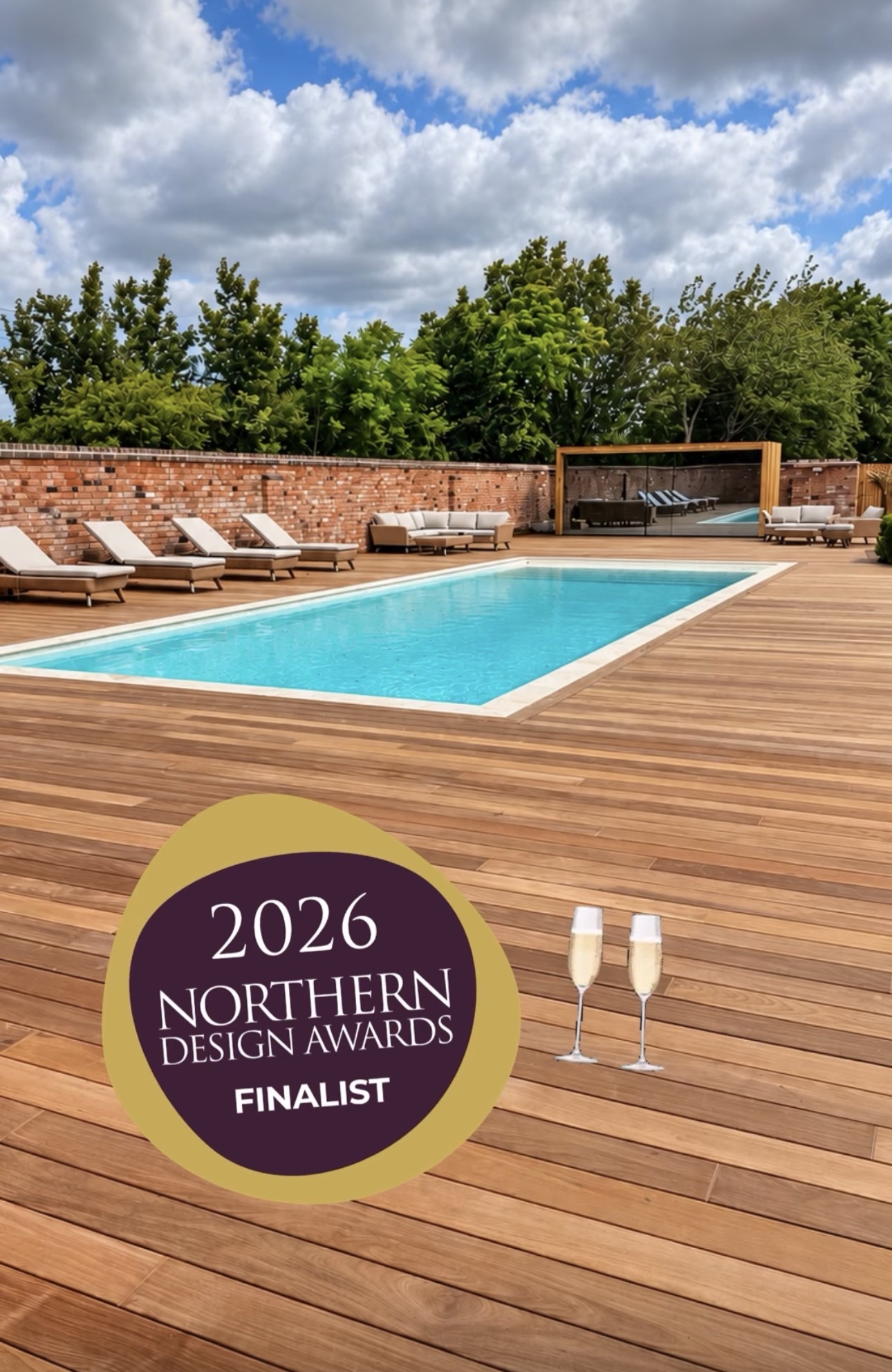 Award-shortlisted outdoor swimming pool with timber decking by Crystal Leisure