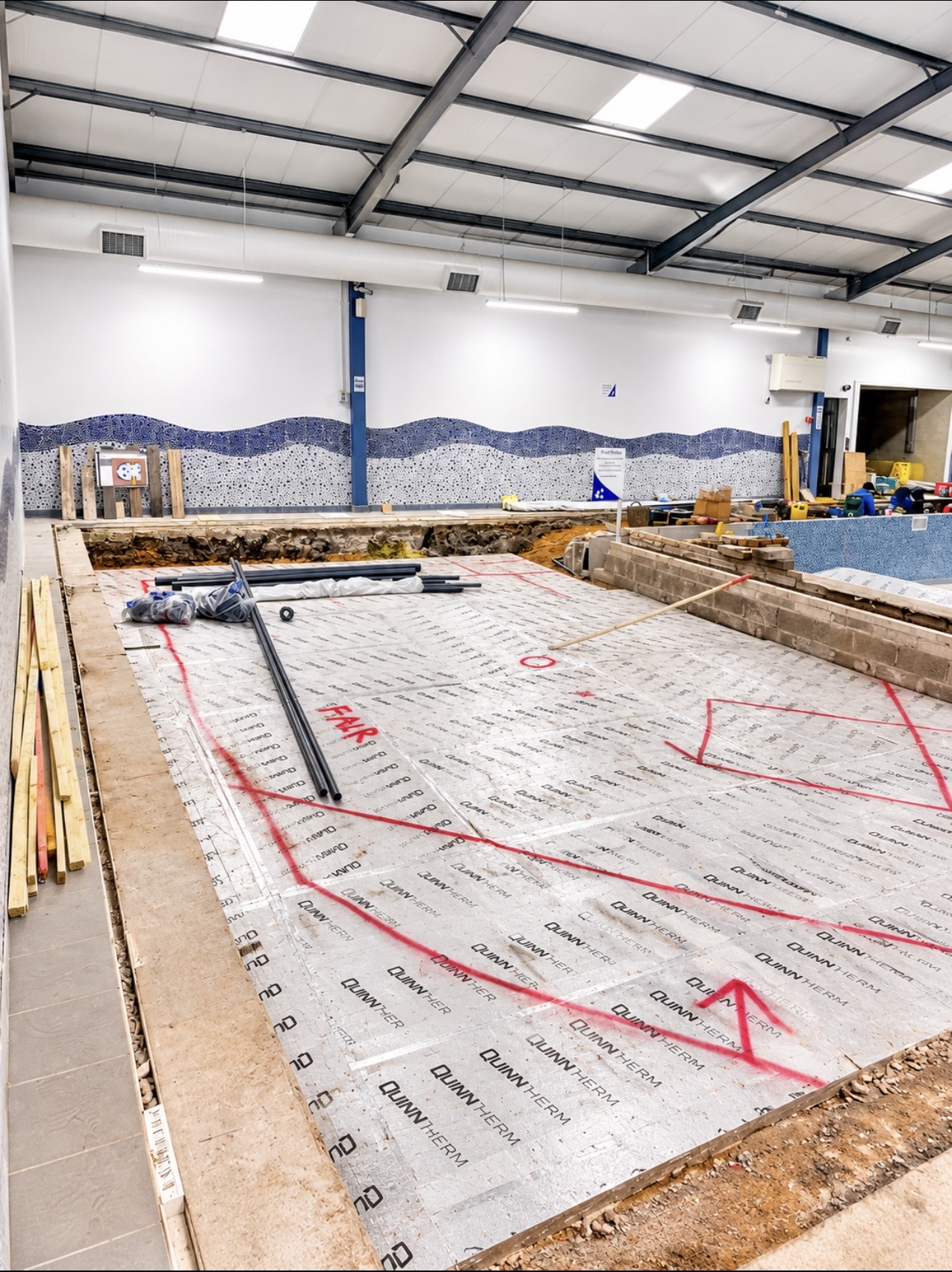 Insulated splash pool base marked out ahead of the reinforced concrete layer