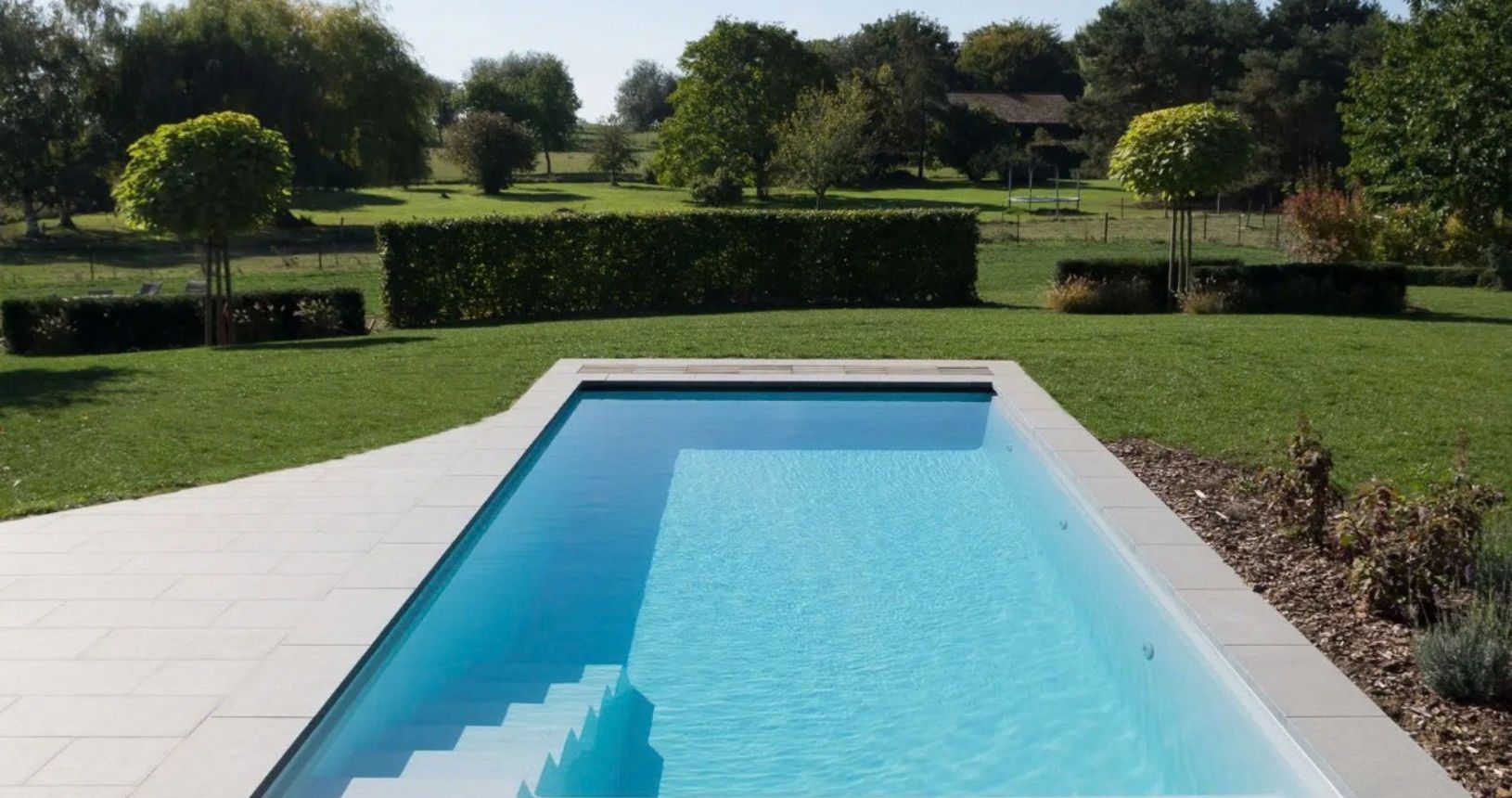 Outdoor swimming pool by Crystal Leisure